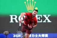 Novak Djokovic serves at Shanghai Masters 2024